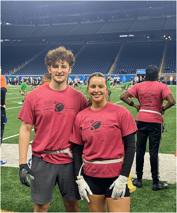 Team members at sports stadium